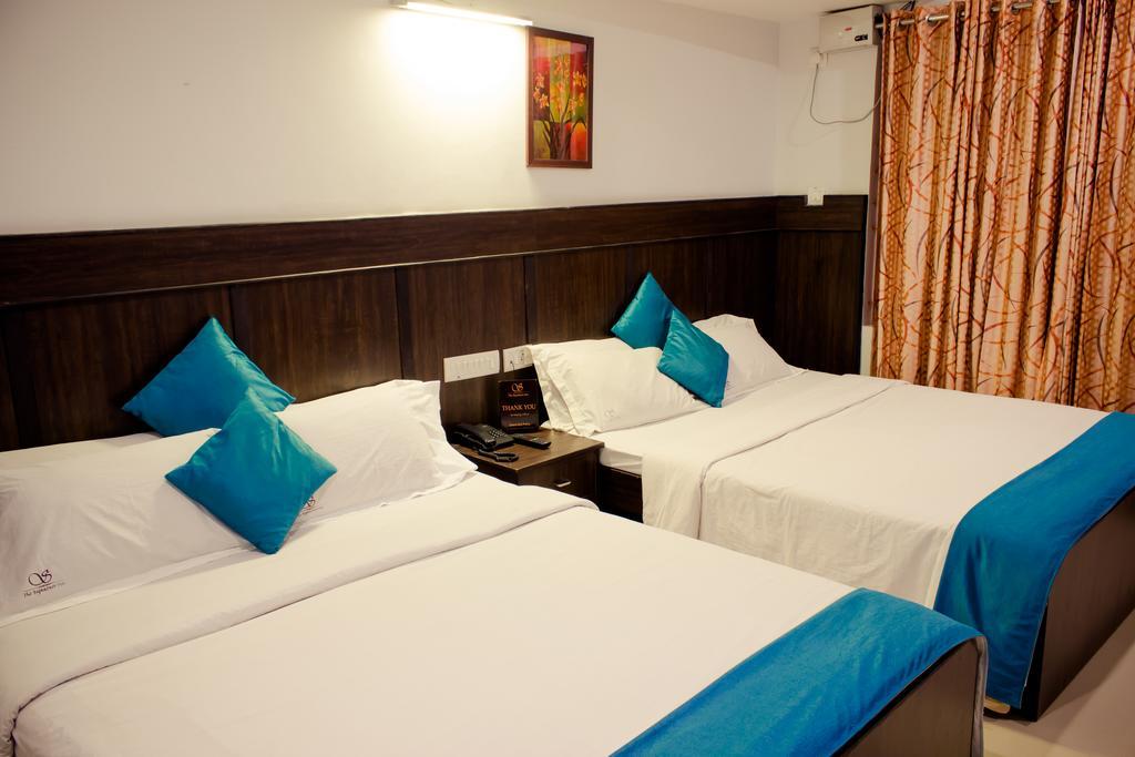 The Signature Inn Bengaluru Szoba fotó