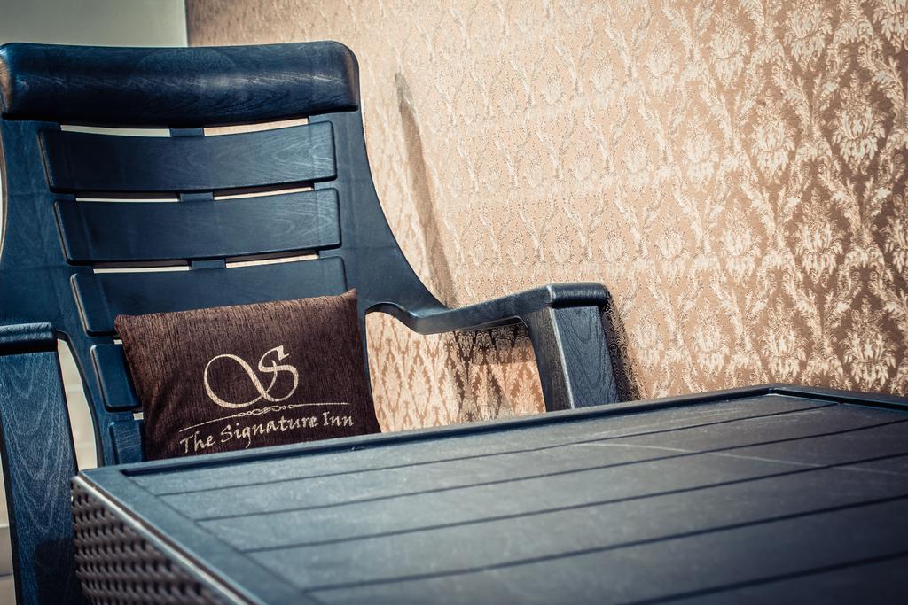 The Signature Inn Bengaluru Szoba fotó