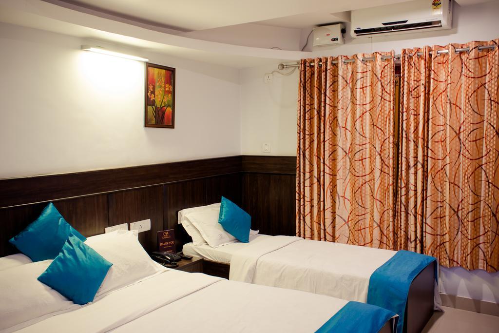 The Signature Inn Bengaluru Szoba fotó